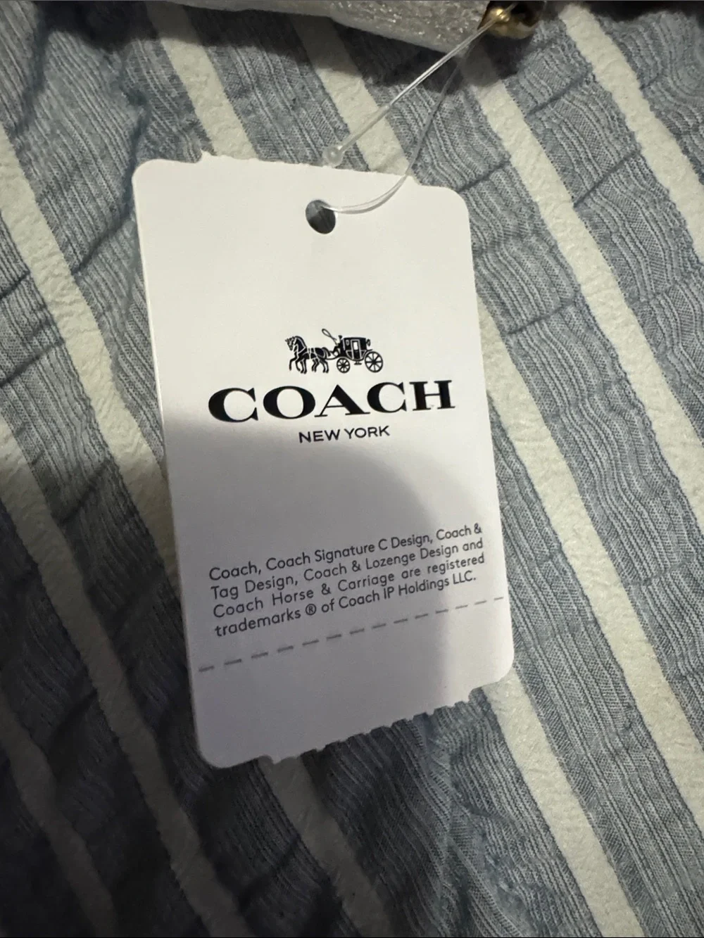 COACH Cream Pebbled Leather Wristlet Clutch with Gold Logo